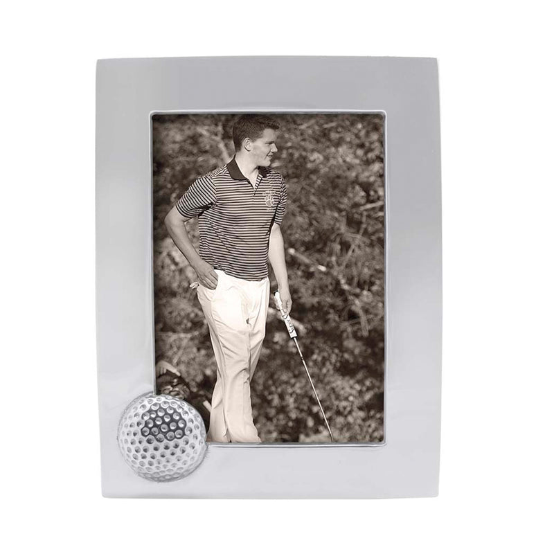 White 5x7 picture frame with golf ball accent, holds a photo