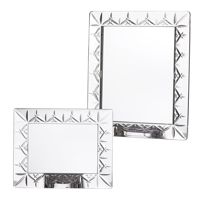 Clear crystal picture frame with cut starburst pattern, shown as a matching pair