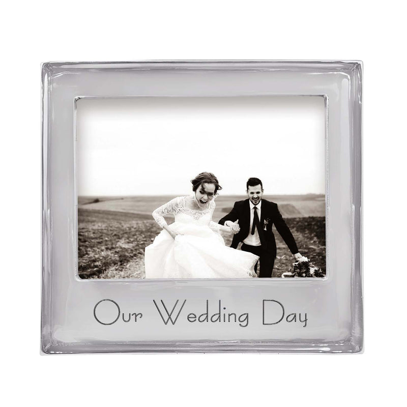 Silver 5x7 picture frame with “Our Wedding Day” text and wedding photo
