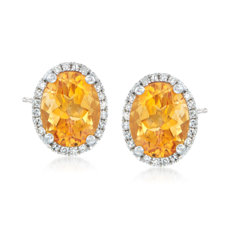 Oval citrine stud earrings with diamond halo, 14kt white gold posts