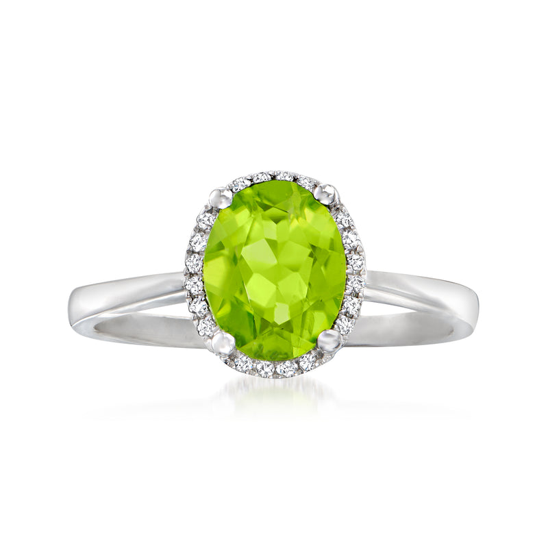14kt white gold peridot ring with oval green gemstone and diamond halo