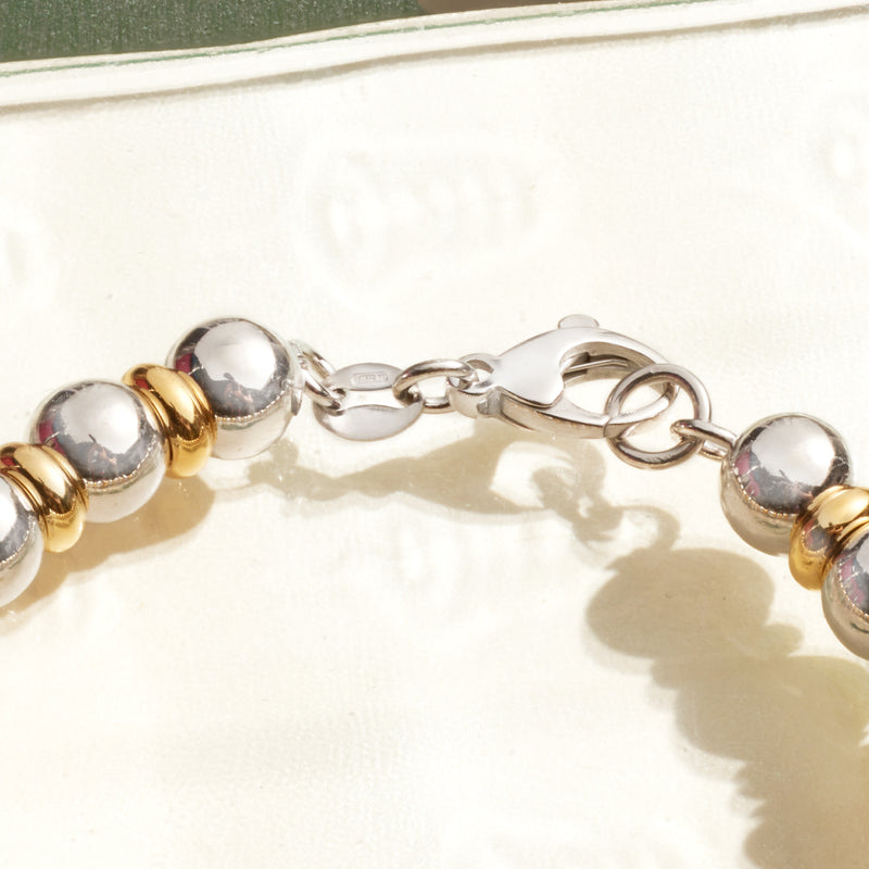 Sterling bead bracelet clasp detail with gold over bands on round beads