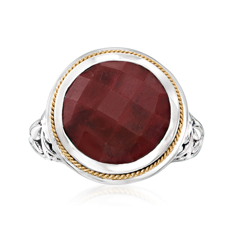 Sterling silver Bali-style ring with oval deep red ruby centerpiece and gold bezel