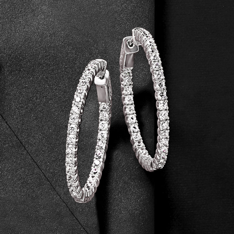 Sterling silver CZ inside-out hoop earrings with clear stones, textured oval hoop pair