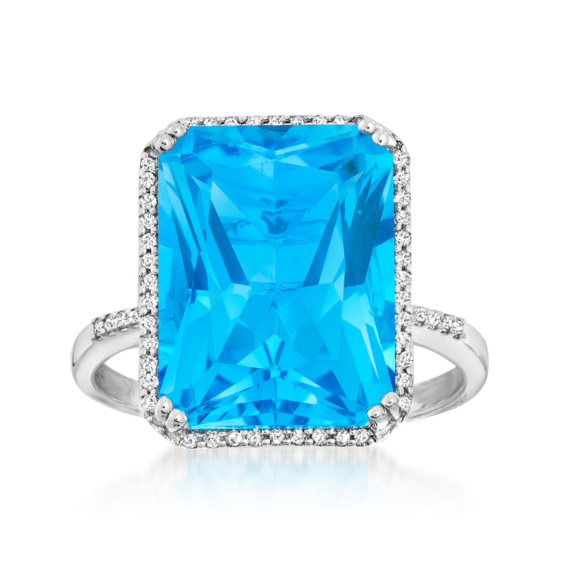 Swiss blue topaz cushion-cut ring with diamond halo on white gold band