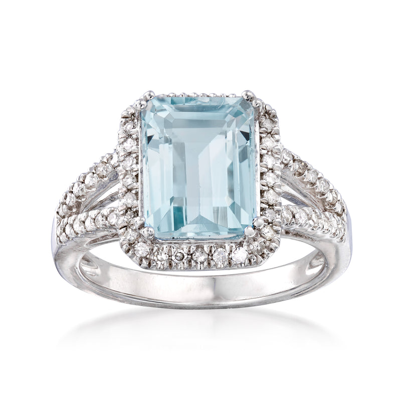 Sterling silver ring with square aquamarine center and diamond halo, split shank