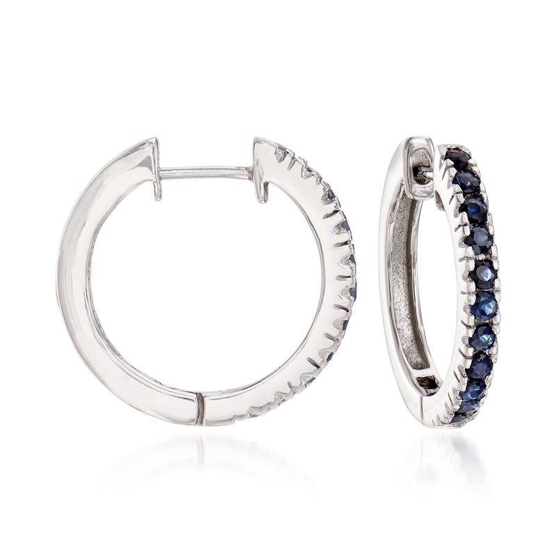 Sterling silver hoop earrings with dark blue sapphire gemstones and hinged closure
