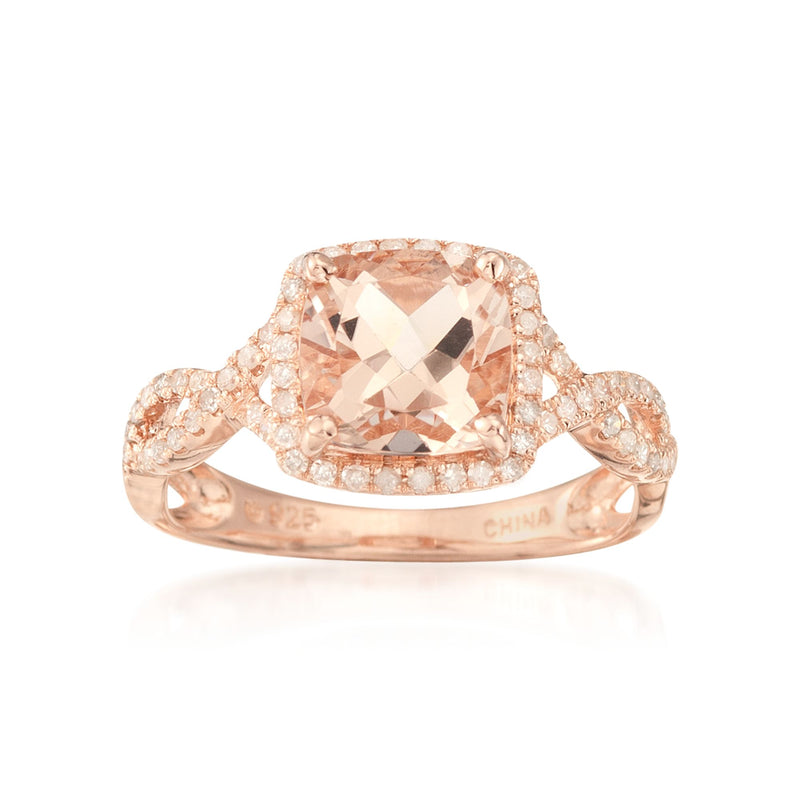 Rose gold morganite ring with oval peach gem and halo of diamonds