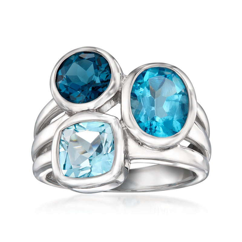 Sterling silver oval blue topaz three-stone ring with high-polish bezels