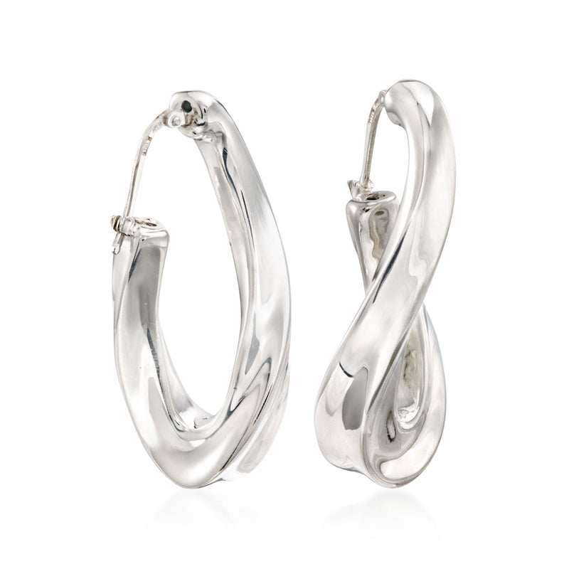 Twisted sterling silver hoop earrings with polished oval profile