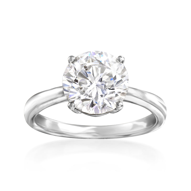 14kt white gold solitaire ring with round CZ center stone, four-prong setting