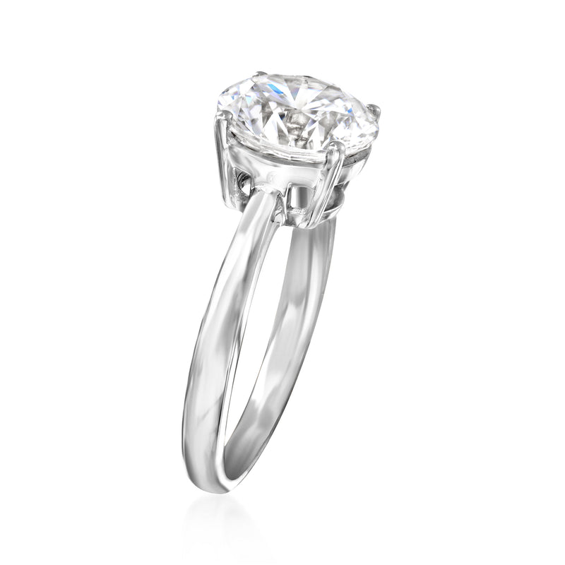 Round CZ solitaire ring in 14kt white gold, side view of prongs and band