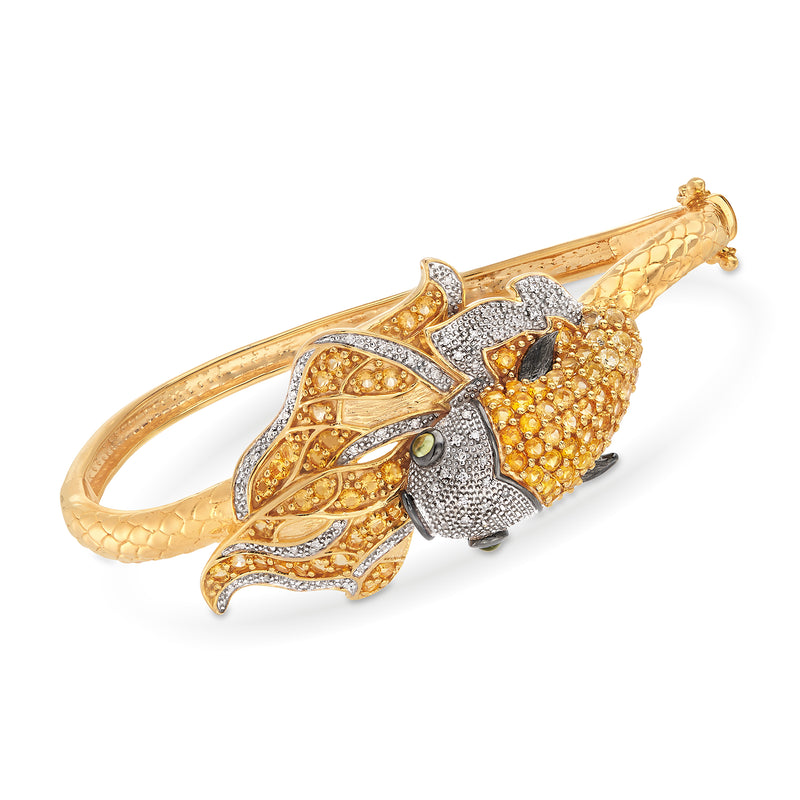 Gold-tone koi fish bangle bracelet with citrine-colored and diamond-like stones