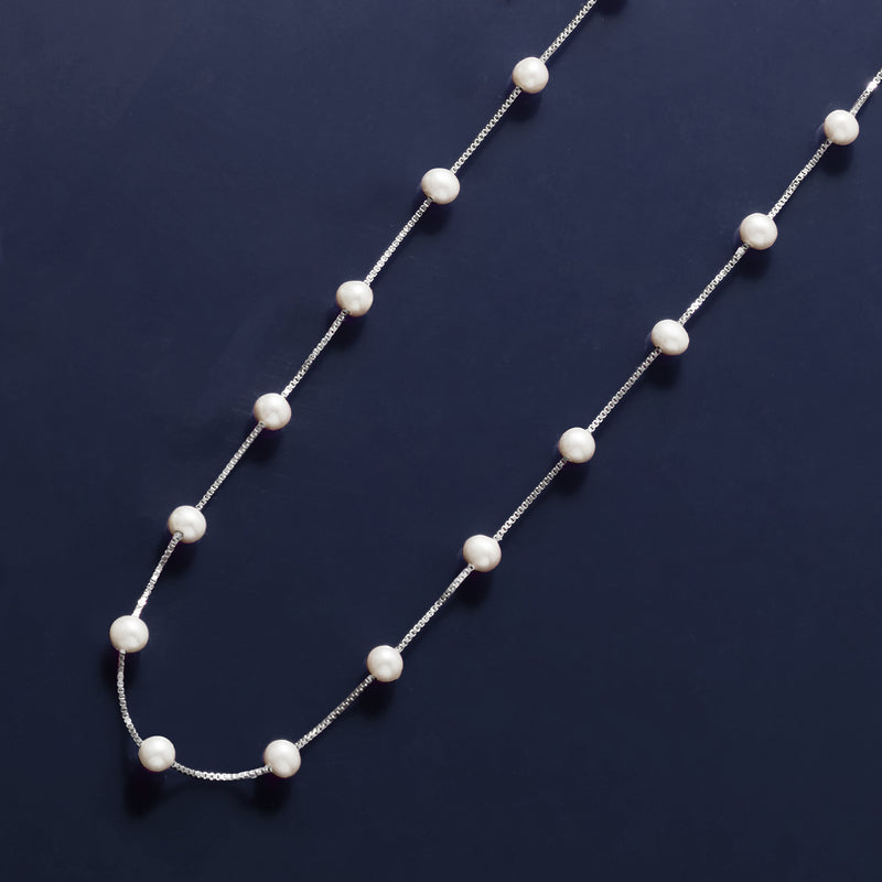 Sterling silver cultured pearl station necklace with round white pearls along the chain