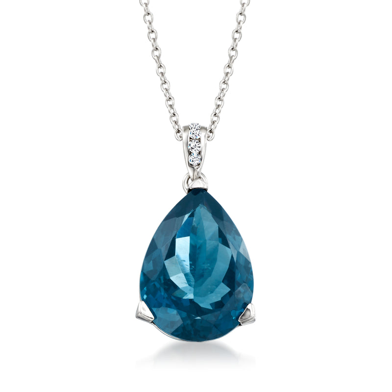 Sterling silver pendant necklace with teardrop blue topaz and small diamond accents