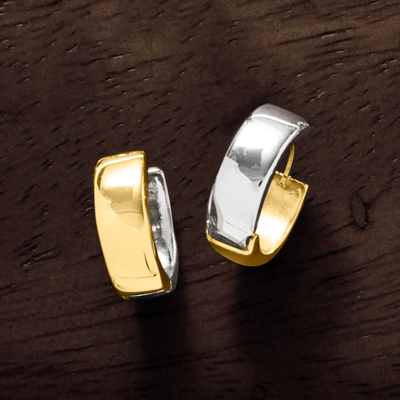 Two-tone reversible huggie hoops with polished sterling silver and 14kt yellow gold bands