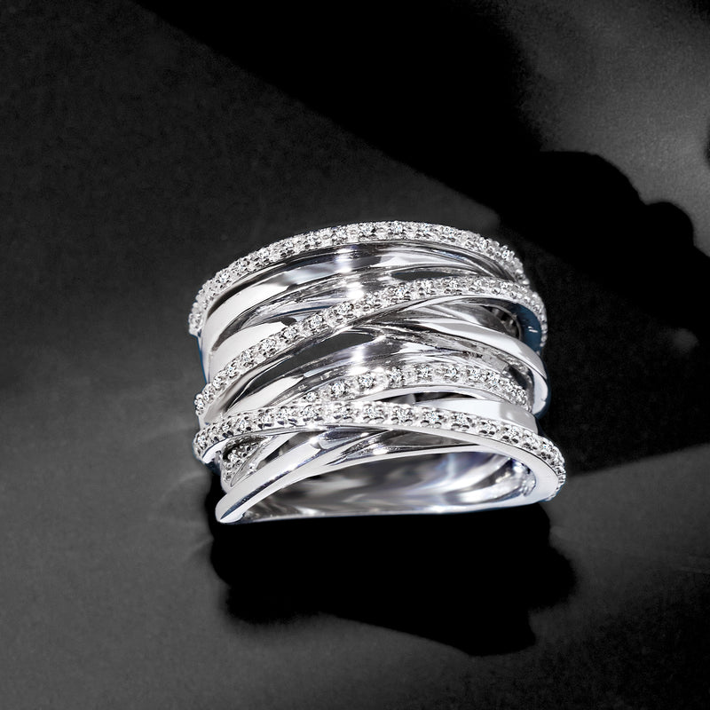 Sterling silver diamond highway ring with multiple stacked bands and sparkling pave