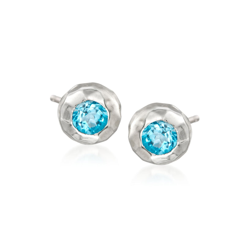 Sterling silver ripple stud earrings with round blue topaz, post backs