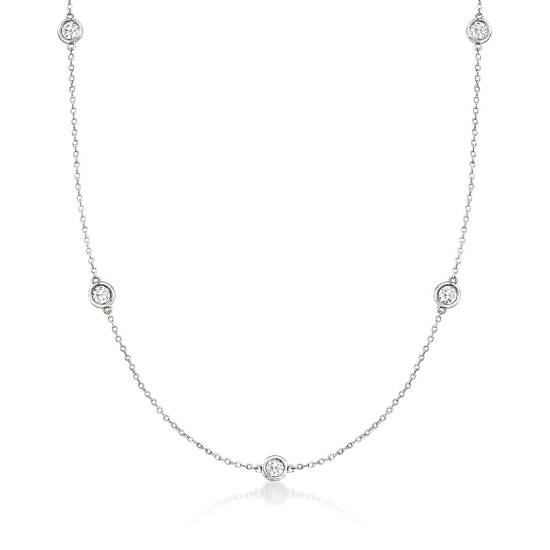 14kt white gold diamond station necklace with five round bezel-set diamonds