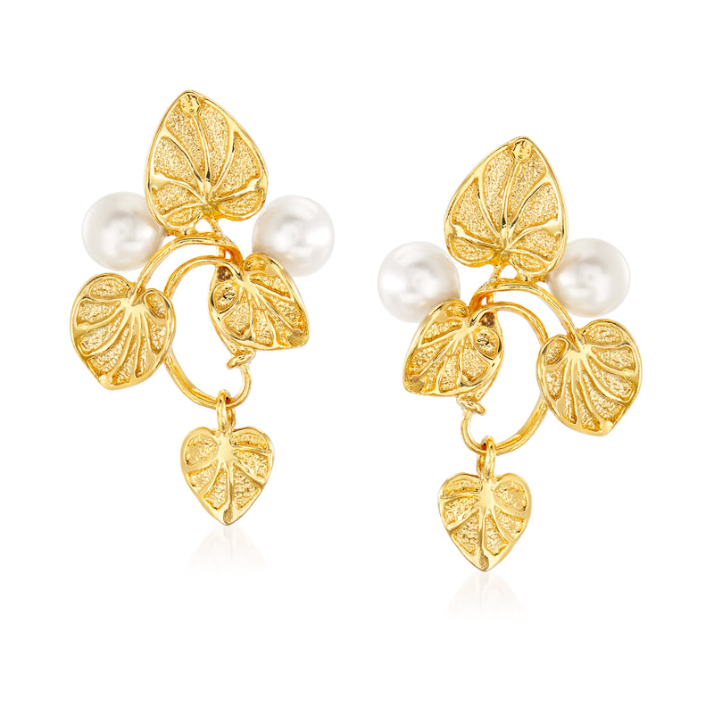 Gold drop earrings with white cultured pearls and dangling leaf vine charms