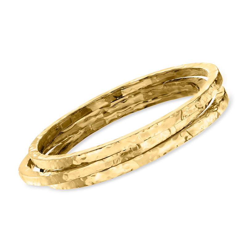 Triple hammered gold bangle bracelets, stacked side view