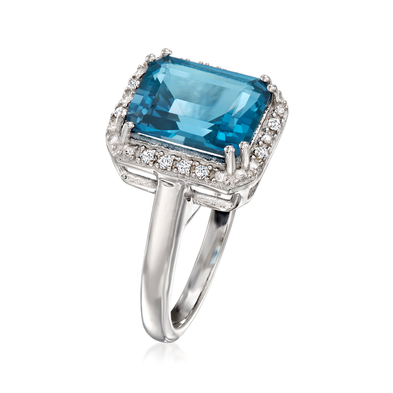 Sterling silver ring angled view, cushion-cut blue topaz with diamond border