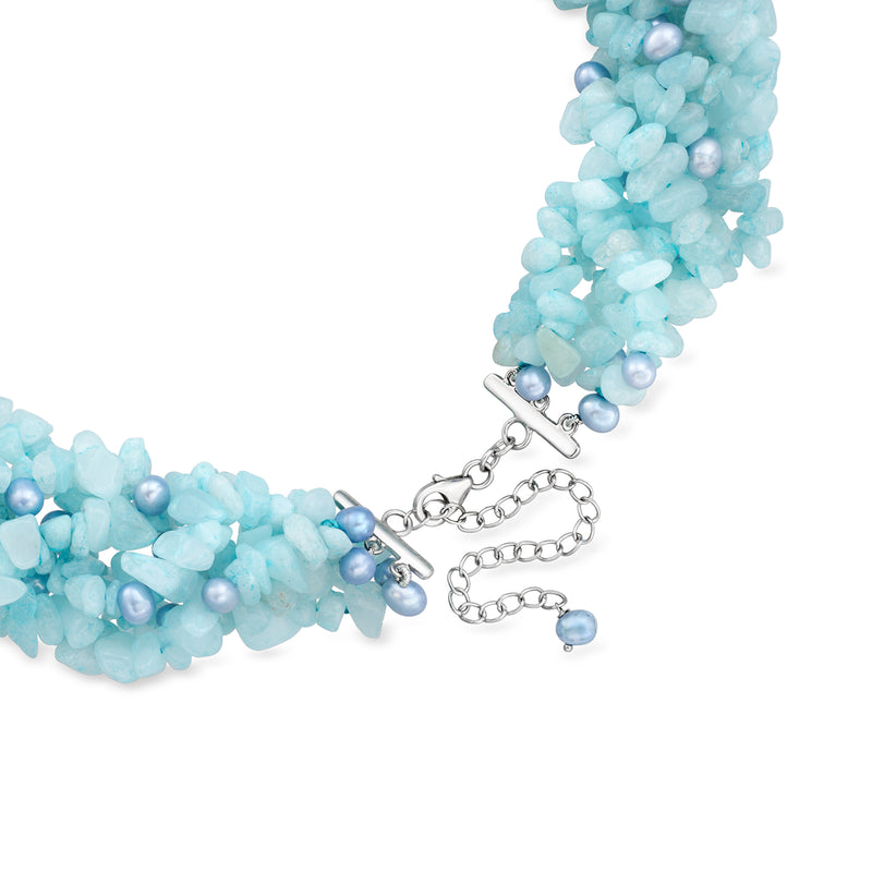 Blue beaded torsade necklace with silver toggle clasp and dangling chain