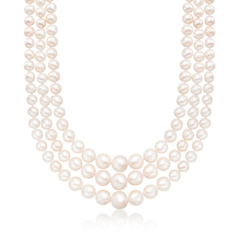 Graduated cultured pearl three-strand necklace with 14kt yellow gold clasp, white pearls