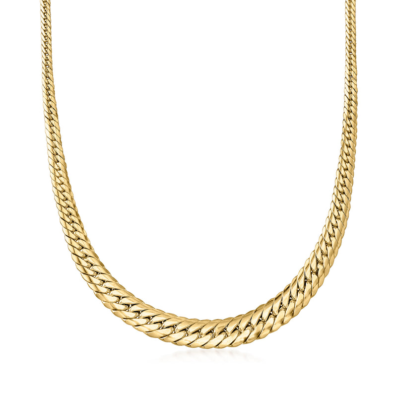 Yellow gold graduated Cuban-link necklace, close view of interlocking links.