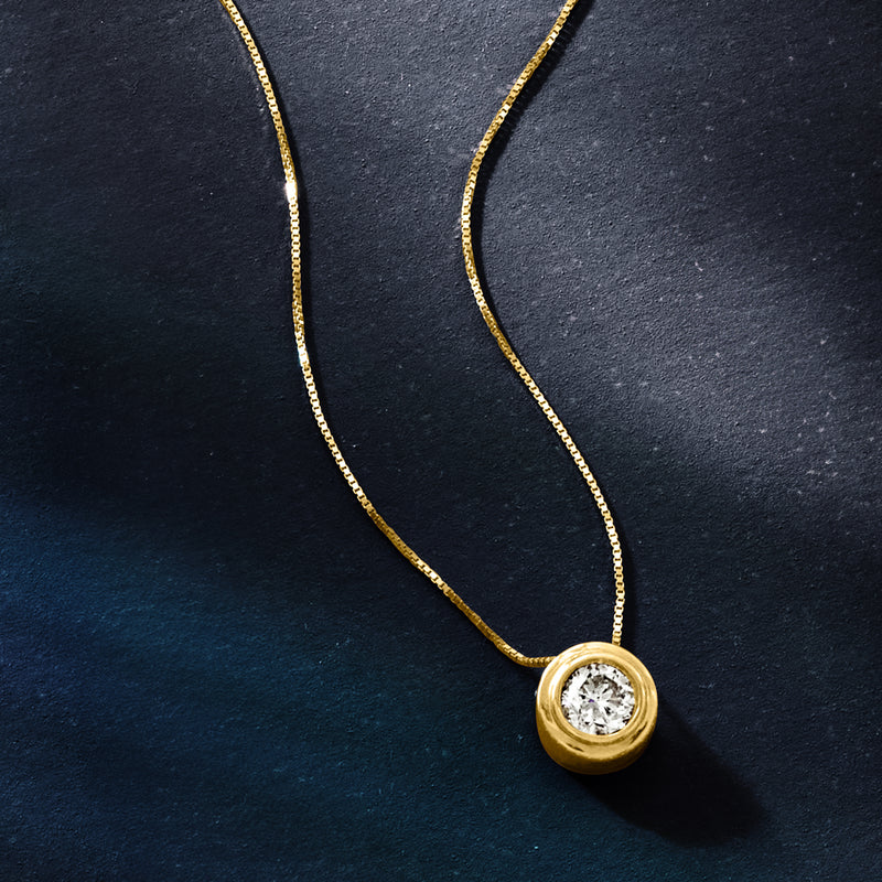 Round double-bezel diamond solitaire pendant with thin 14kt yellow gold chain