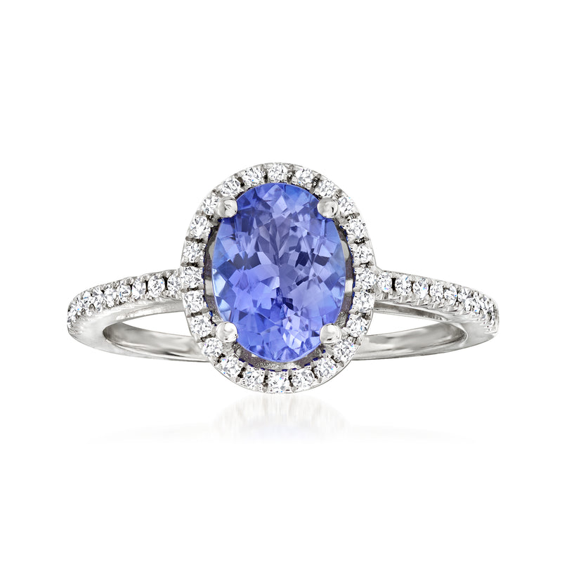 14kt white gold ring with oval blue tanzanite center and diamond halo