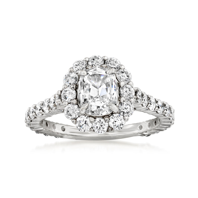 18kt white gold diamond engagement ring with square center stone and round halo