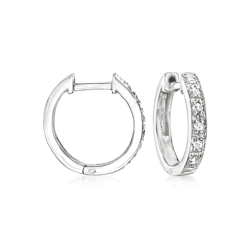 Sterling silver diamond-accented huggie hoop earrings, hinged with clear stone detail
