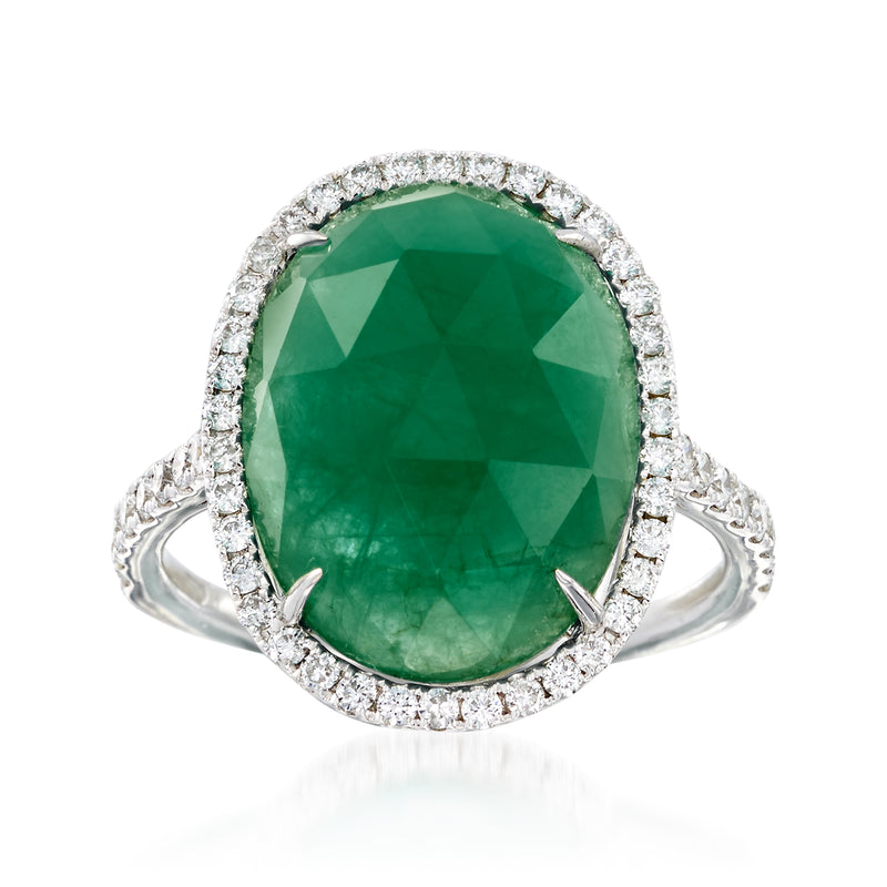 White gold ring with large green oval gemstone and diamond halo