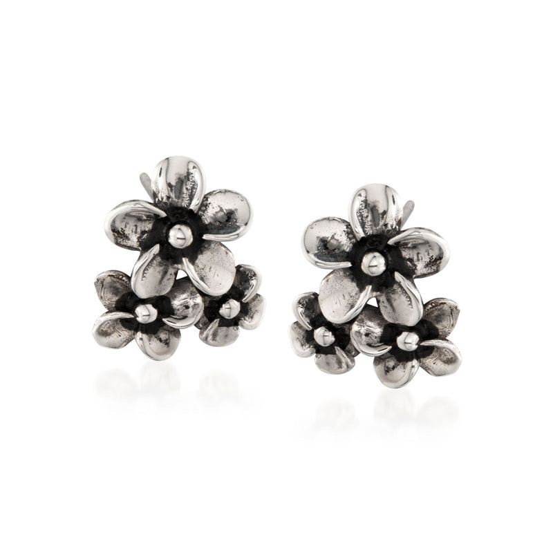 Sterling silver hibiscus floral cluster stud earrings, polished petals with dark center
