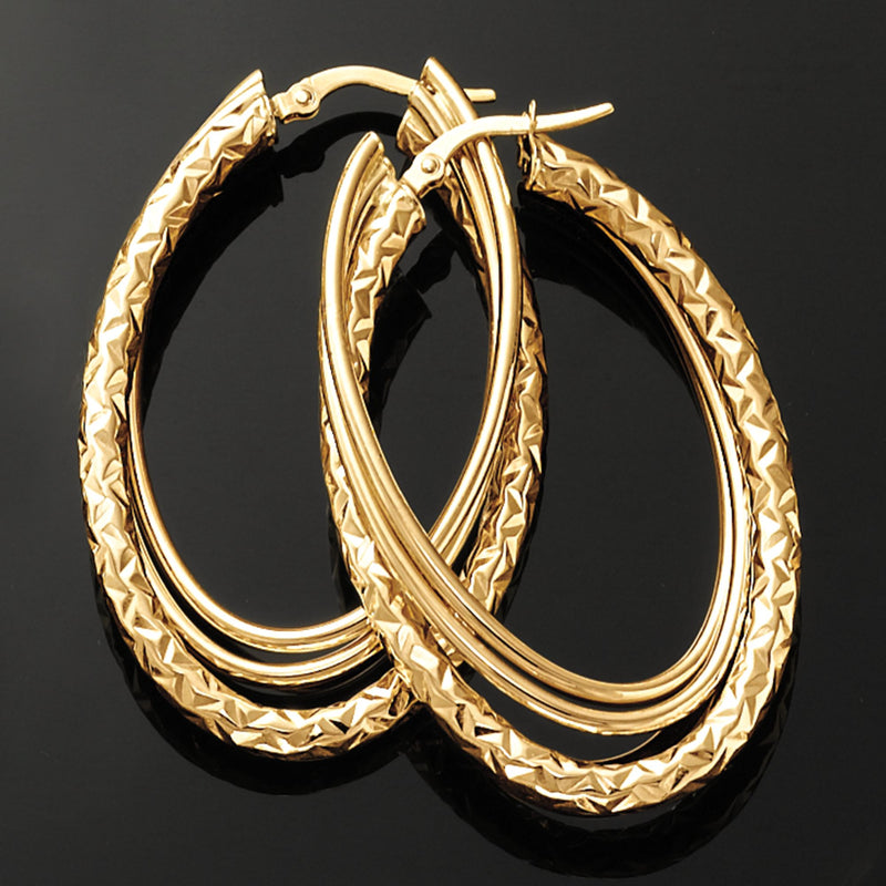 Twisted triple hoop earrings, textured oval 14kt yellow gold hoops, sideways view