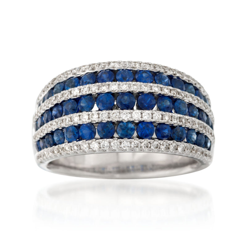 18kt white gold dome ring with three rows of blue sapphires and diamond accents