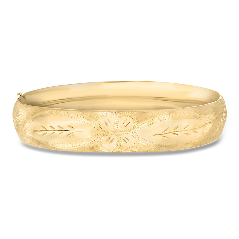14kt yellow gold bangle bracelet with engraved floral pattern