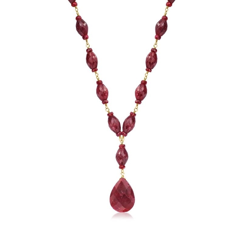 Ruby drop necklace with pear-shaped red gemstones on gold-over-silver chain