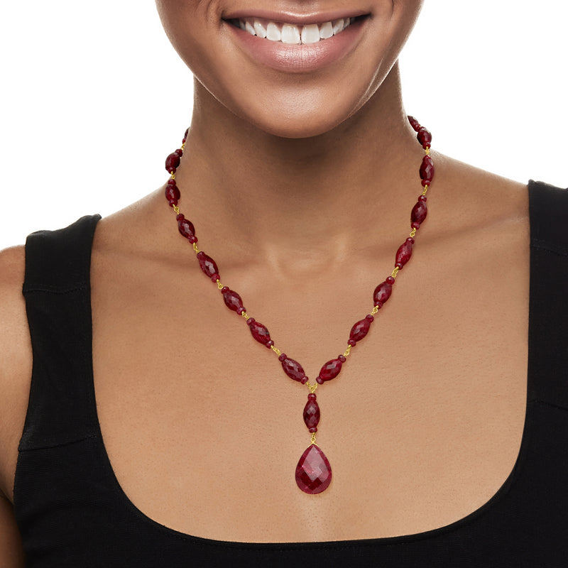 Ruby drop necklace featuring red teardrop pendant and oval beads in gold-over-silver
