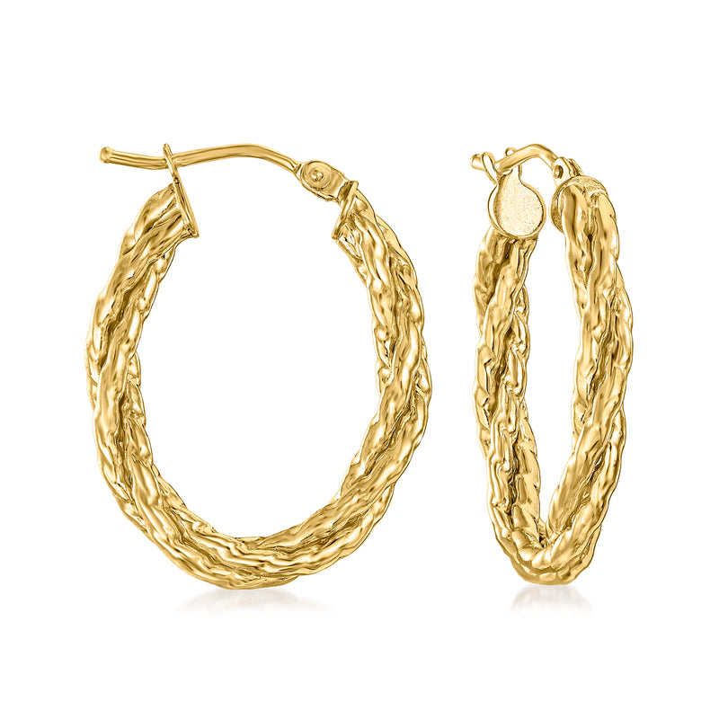 Twisted oval hoop earrings in yellow gold tone, polished braid texture.