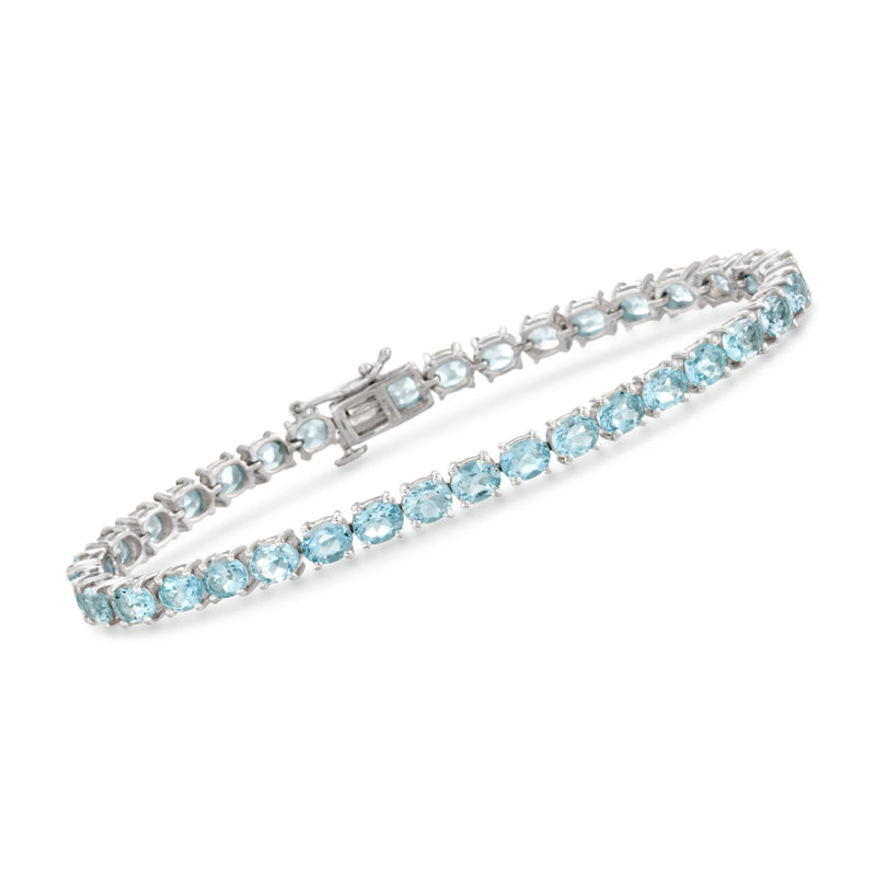 Sterling silver tennis bracelet with sky blue topaz gemstones in linked setting