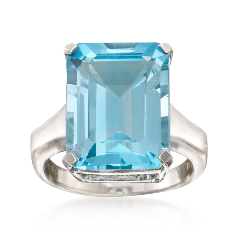 Sterling silver ring with sky blue emerald-cut topaz centerpiece