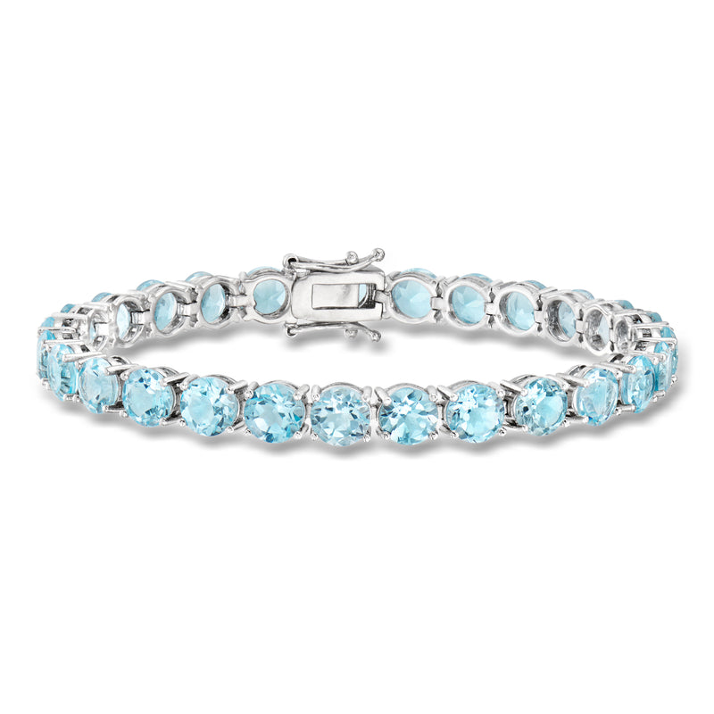 Sterling silver tennis bracelet with sky blue topaz oval stones and box clasp