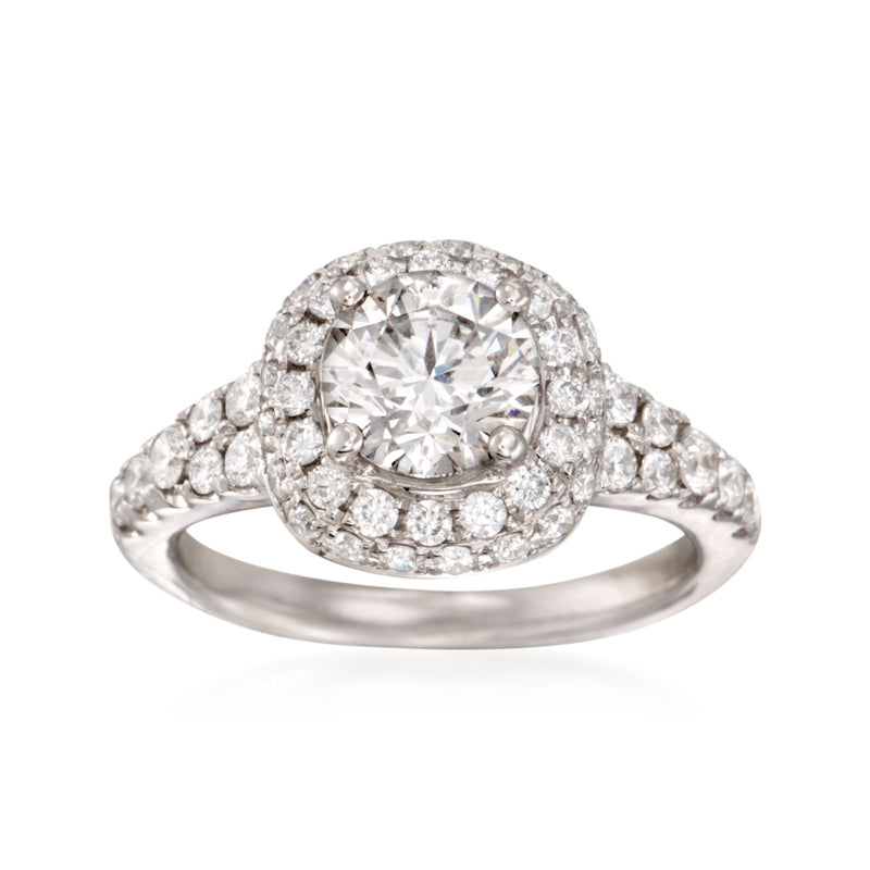 18k white gold diamond halo engagement ring with round center stone and side diamonds