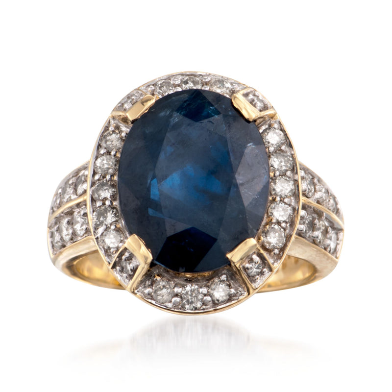 18k yellow gold ring with oval blue sapphire and diamond halo