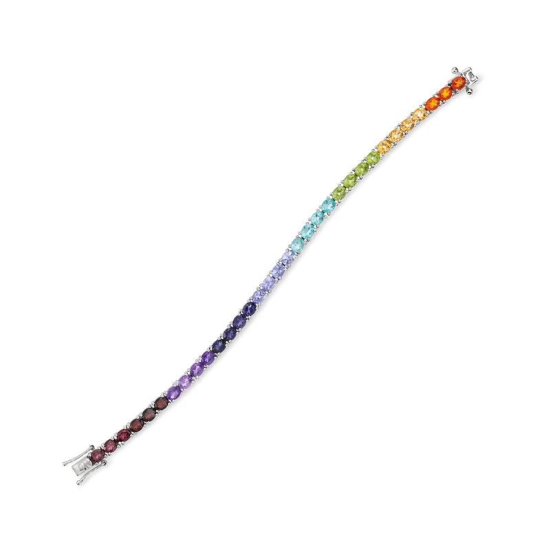 Sterling silver tennis bracelet featuring a long row of rainbow gemstones with clasp end