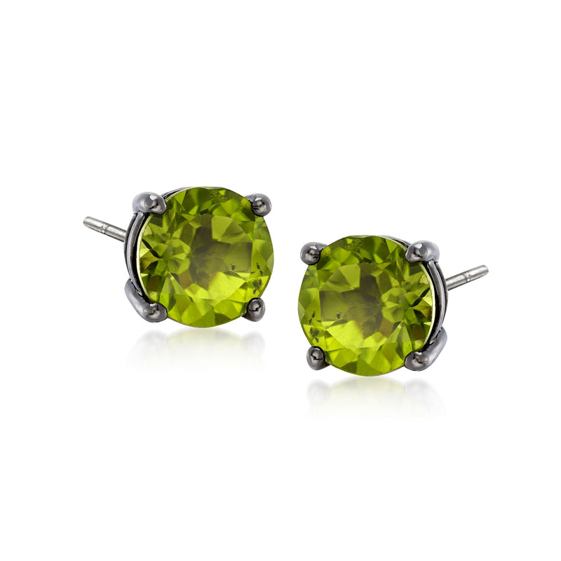 Sterling silver peridot stud earrings with oval green gemstone setting