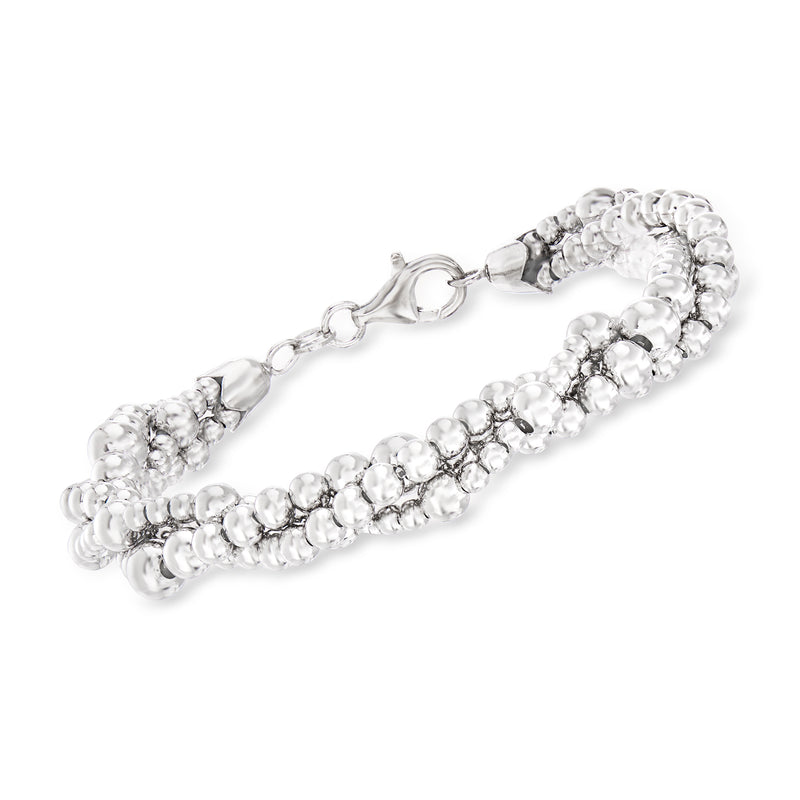 Twisted sterling silver multi-bead bracelet with small round beads and clasp