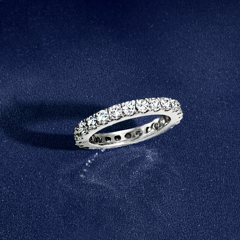 Diamond eternity band in 14kt white gold, angled view